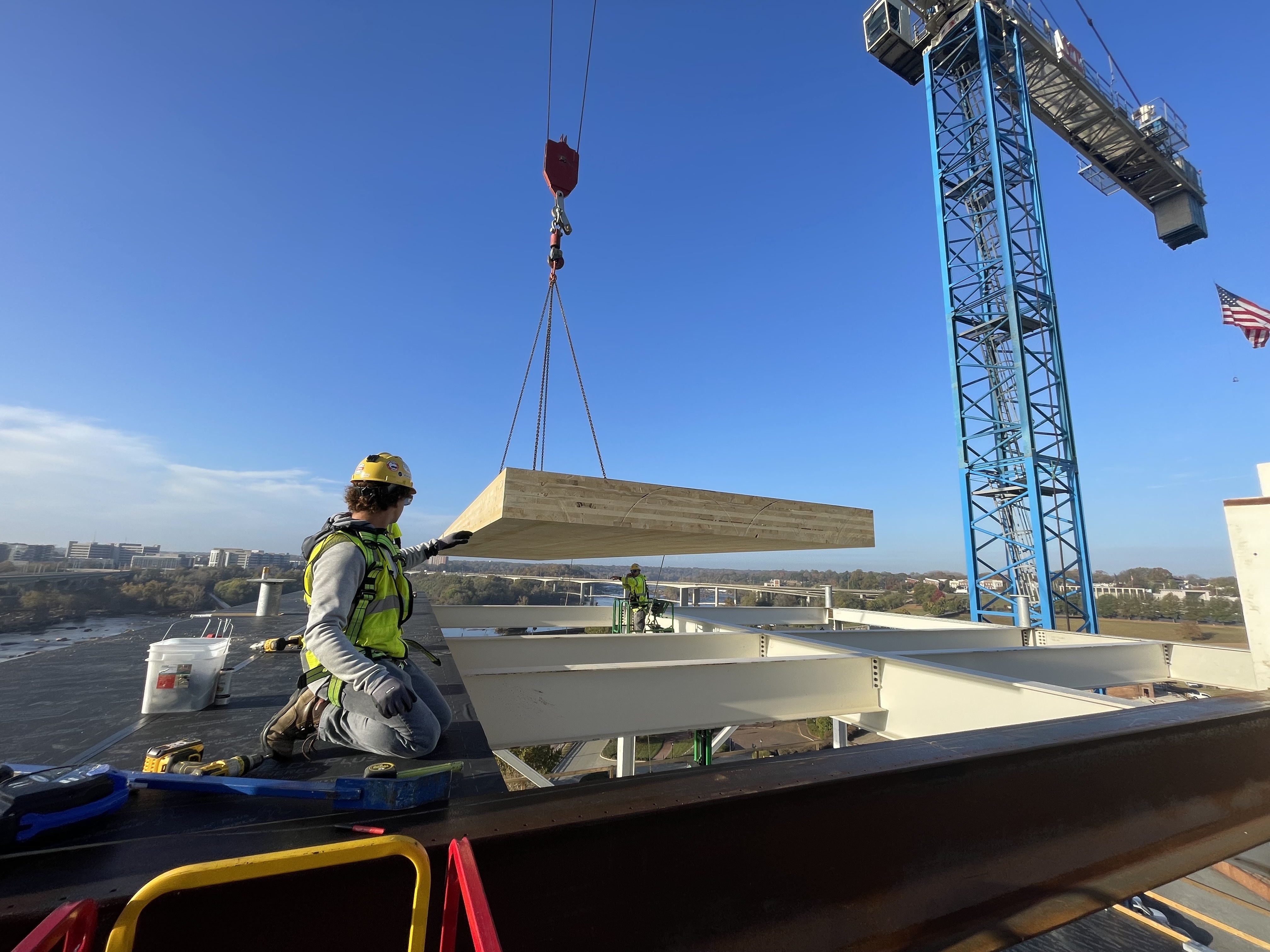 Structural engineer reviewing timber connection details on BIM model